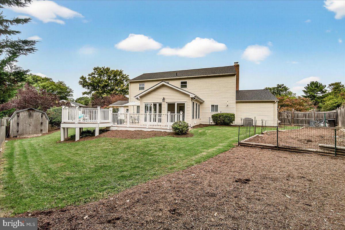 19624 Westerly Avenue Poolesville, MD 20837 - Photo 40 of 44 a view of a house with backyard and garden