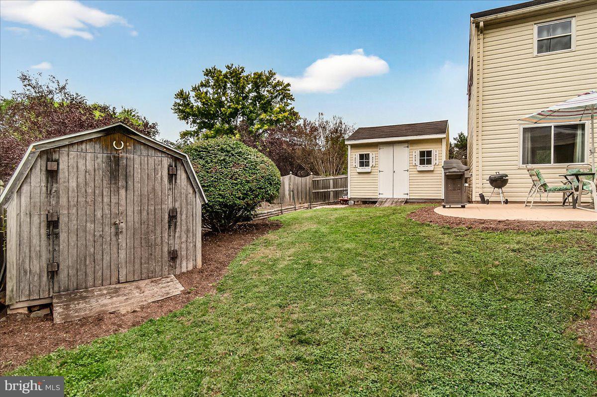 19624 Westerly Avenue Poolesville, MD 20837 - Photo 42 of 44 a front view of a house with garden