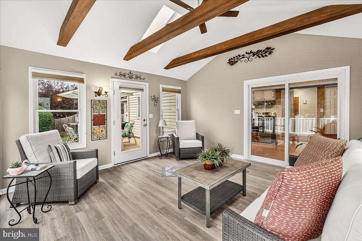 19624 Westerly Avenue Poolesville, MD 20837 - Photo 7 of 44 a living room with furniture and wooden floor
