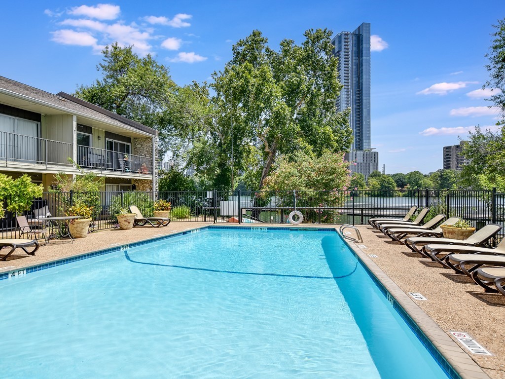 500 East Riverside Drive, Unit 169 Austin, TX 78704 - Photo 15 of 19 a view of a swimming pool with lounge chair