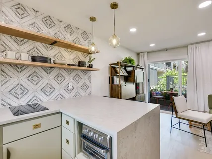 a kitchen with a cabinets and appliances