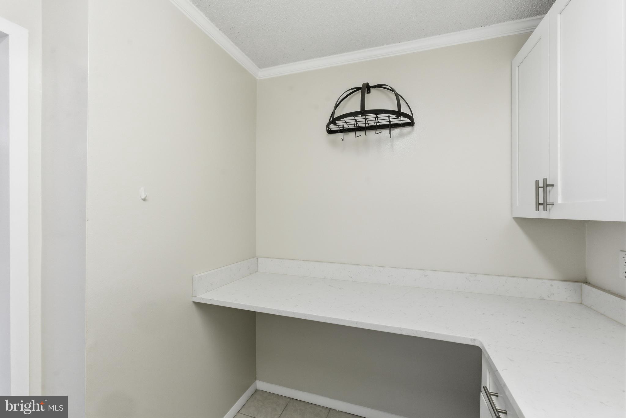 5225 Pooks Hill Road, Unit 1206S Bethesda, MD 20814 - Photo 12 of 12 a view of small space with racks on the wall