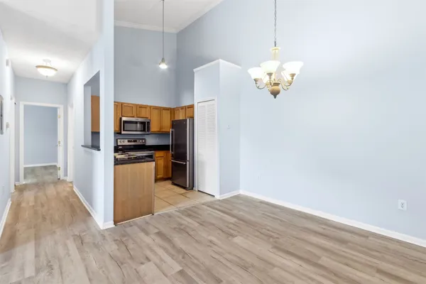a view interior of kitchen and refrigerator