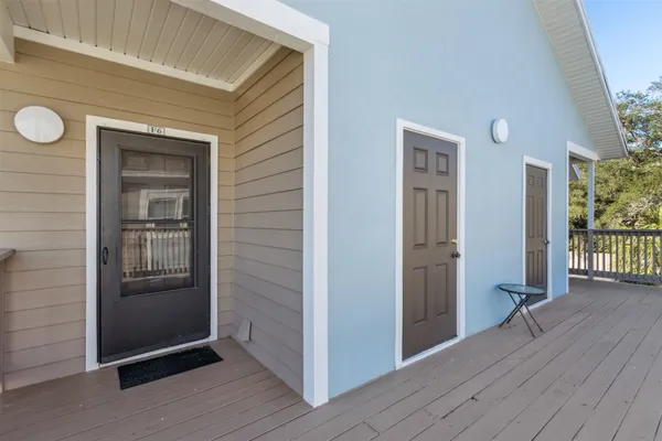 a view of outdoor space wooden floor and entryway