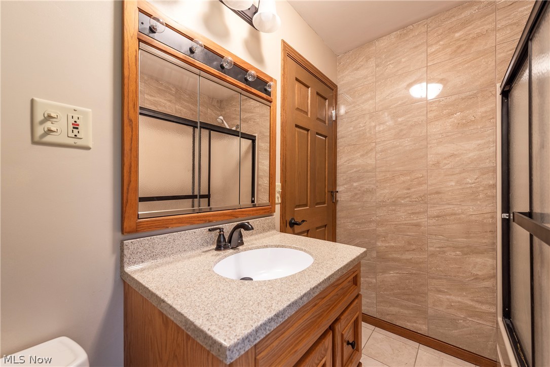 9990 Broadview Road Broadview Heights, OH 44147 - Photo 23 of 47 Bathroom with vanity and tile patterned flooring