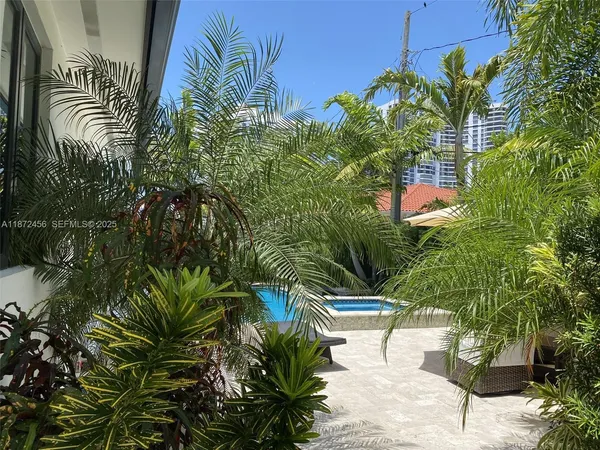 a view of outdoor space and yard