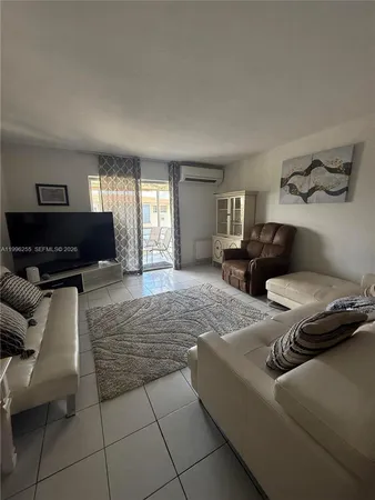 a bedroom with bed and window