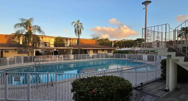 a view of a house with a swimming pool