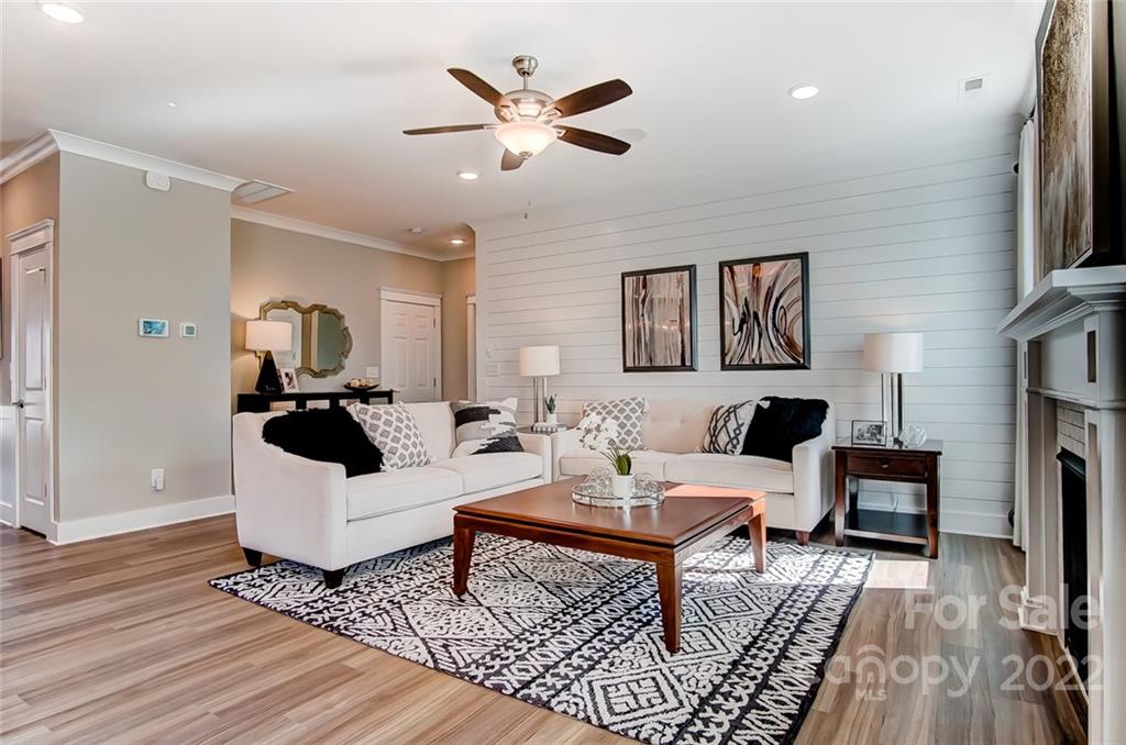 1006 Baldwin Drive Lancaster, SC 29720 - Photo 13 of 48 a living room with furniture a ceiling fan and a rug