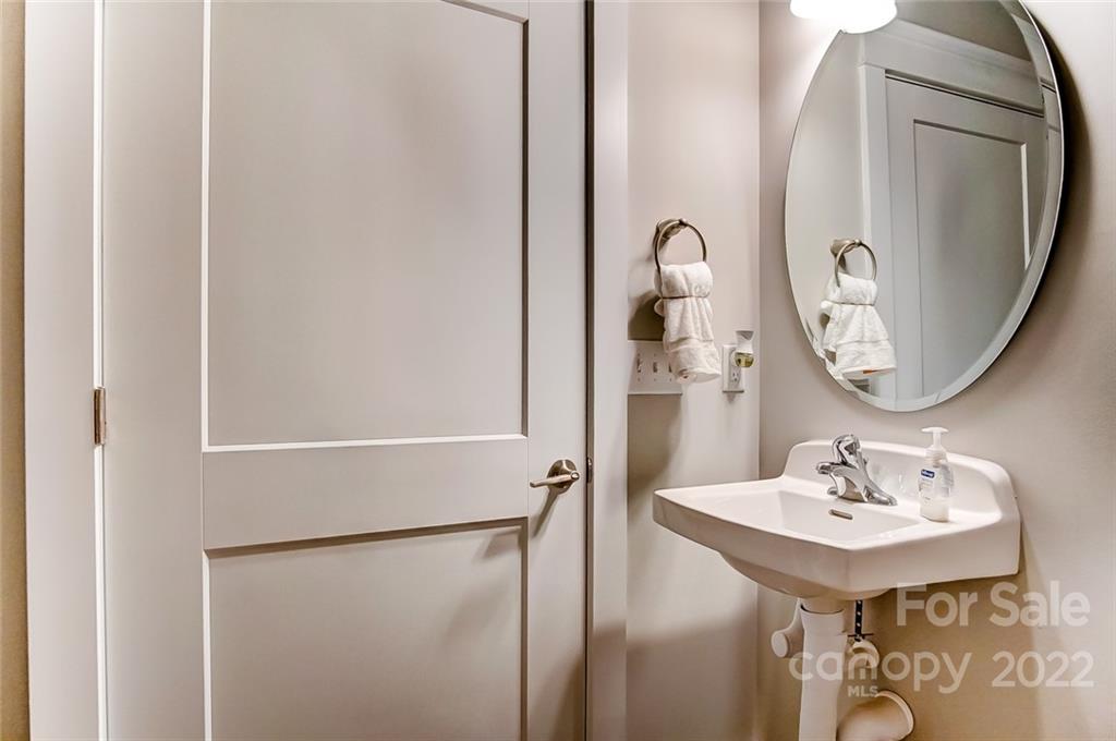 1006 Baldwin Drive Lancaster, SC 29720 - Photo 26 of 48 a bathroom with a sink a mirror and a toilet