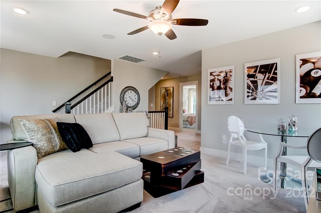 1006 Baldwin Drive Lancaster, SC 29720 - Photo 30 of 48 a living room with furniture and a ceiling fan