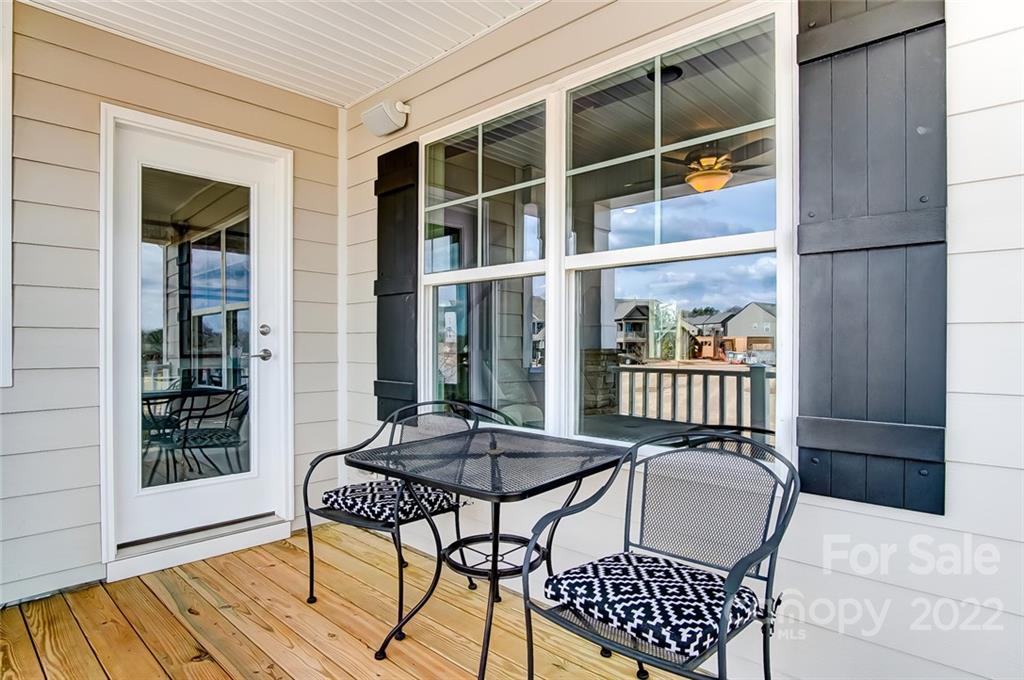 1006 Baldwin Drive Lancaster, SC 29720 - Photo 33 of 48 a patio with glass top table and chairs
