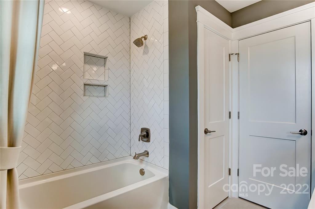 1006 Baldwin Drive Lancaster, SC 29720 - Photo 42 of 48 a bathroom with a bathtub and a shower