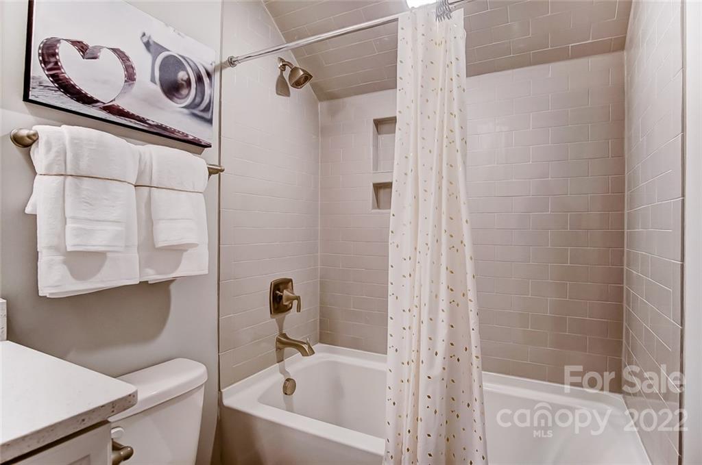 1006 Baldwin Drive Lancaster, SC 29720 - Photo 45 of 48 a bathroom with a bathtub and shower