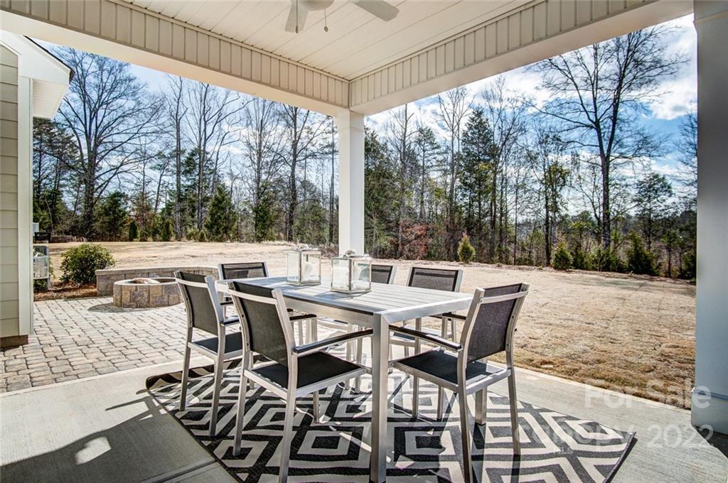 1006 Baldwin Drive Lancaster, SC 29720 - Photo 48 of 48 a view of a patio with a table chairs and backyard