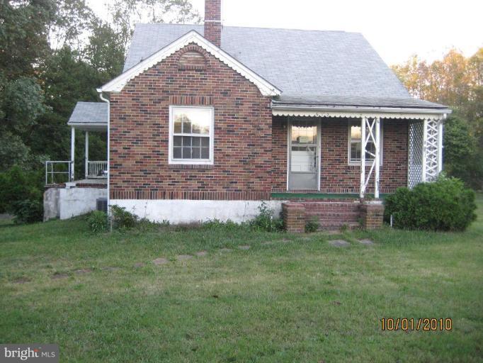 612 Reckord Road Fallston, MD 21047 - Photo 1 of 8 a front view of a house with a yard