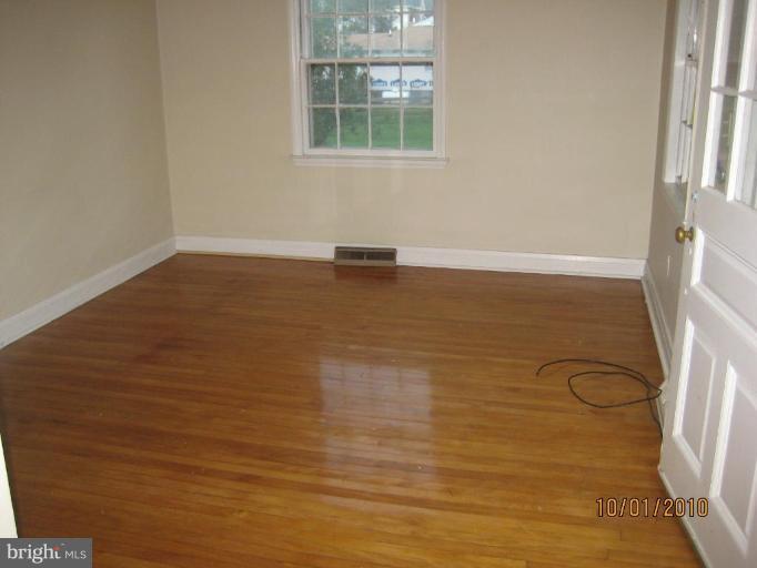 612 Reckord Road Fallston, MD 21047 - Photo 6 of 8 a view of a room with rack on the wall and a window