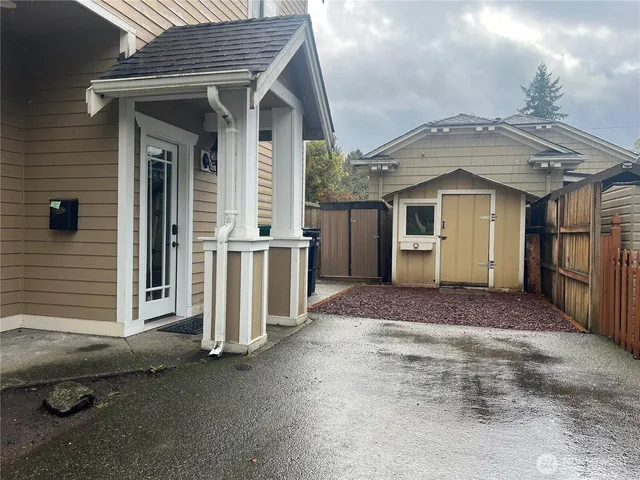 a front view of a house with a garage