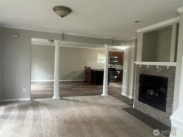 a living room with a fireplace