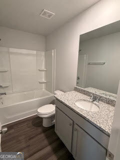 142 Brexley Drive Calhoun, GA 30701 - Photo 22 of 28 a bathroom with a granite countertop sink toilet and shower