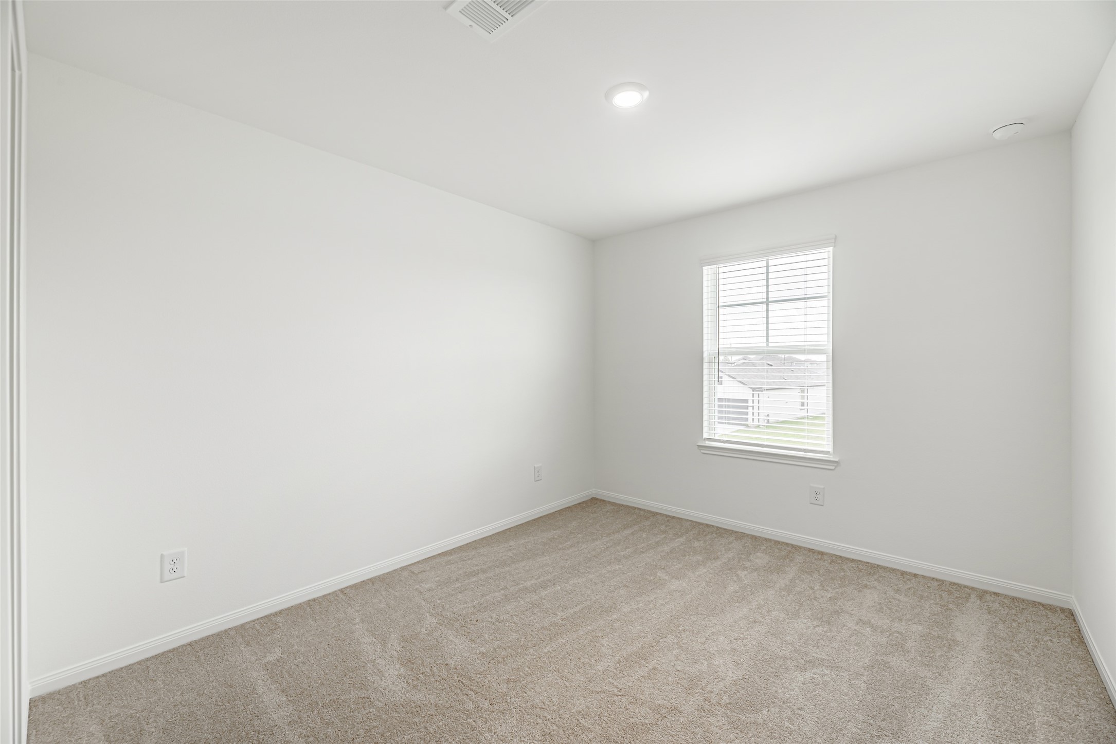 23422 Wagon Cart Road Hockley, TX 77447 - Photo 20 of 28 an empty room with a window