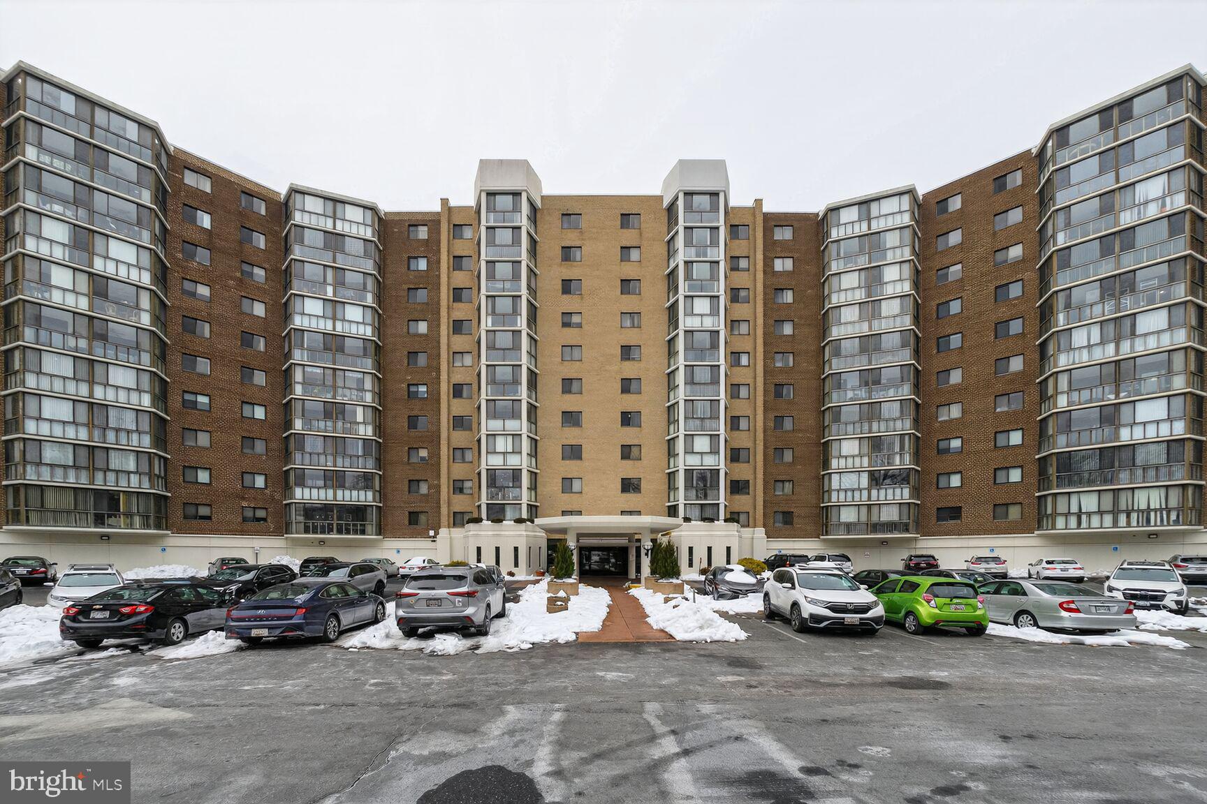 15115 Interlachen Drive, Unit 3812 Silver Spring, MD 20906 - Photo 2 of 46 a car parked in front of a buildings
