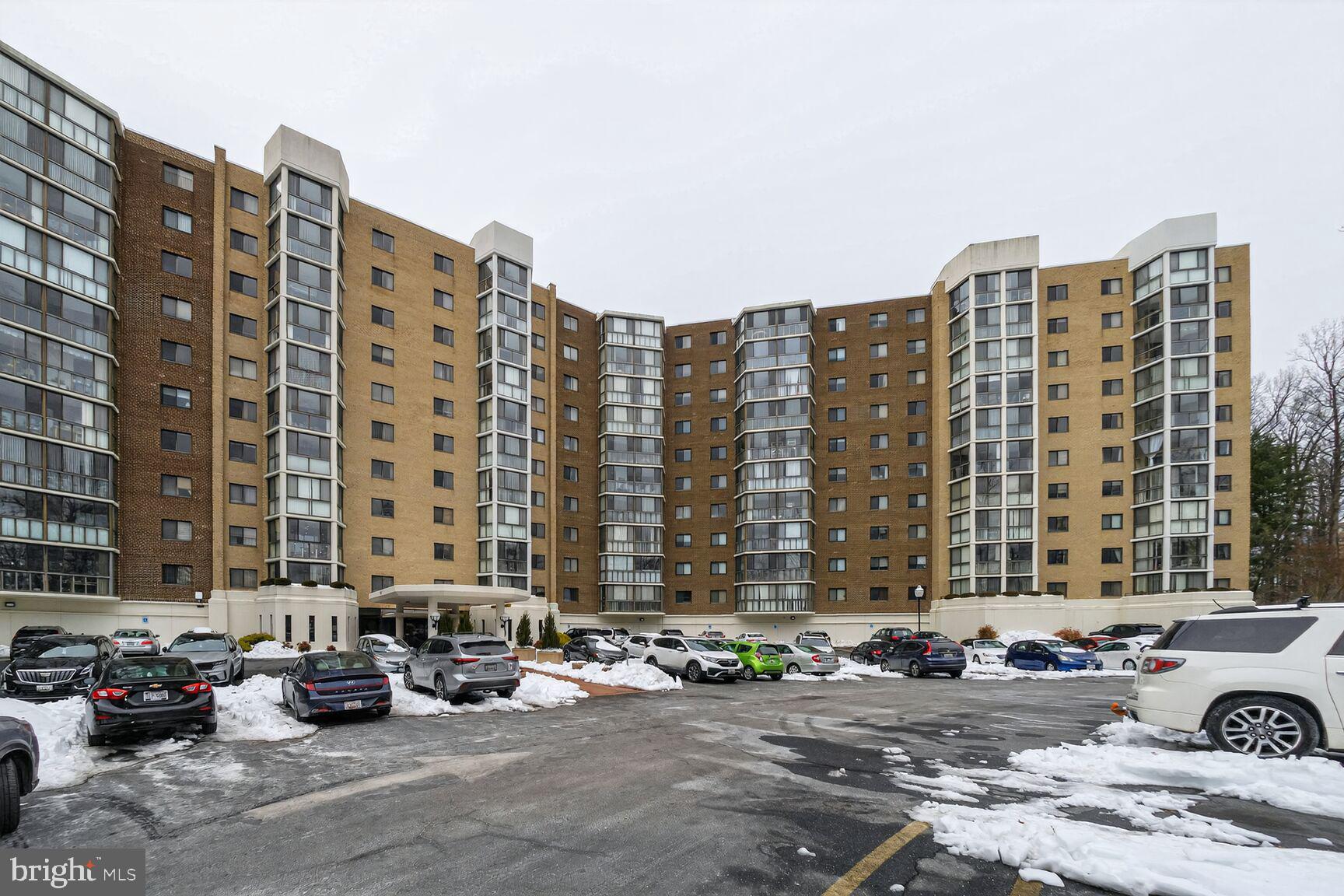 15115 Interlachen Drive, Unit 3812 Silver Spring, MD 20906 - Photo 45 of 46 a view of balcony with multi story residential apartment building in front of it