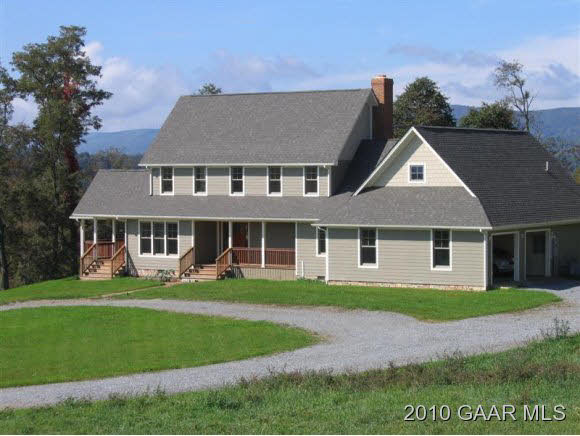 599 Shirey Road Swoope, VA 24479 - Photo 1 of 12 a front view of a house with a yard and garage