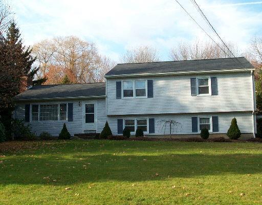 13 Lincoln Road Newtown, CT 06470 - Photo 1 of 1 a front view of a house with a yard