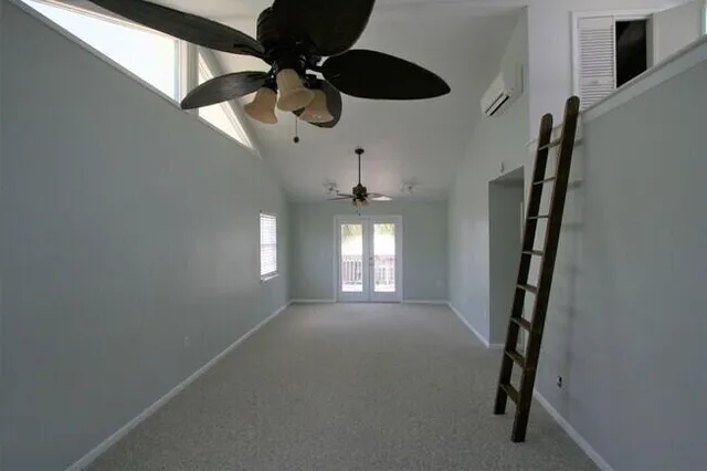 a view of a hallway with a chandelier