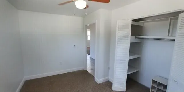 a view of hallway with stairs