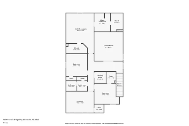 a utility room with a cabinet and a refrigerator