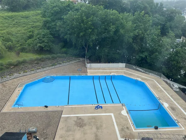 a view of a back yard from a balcony