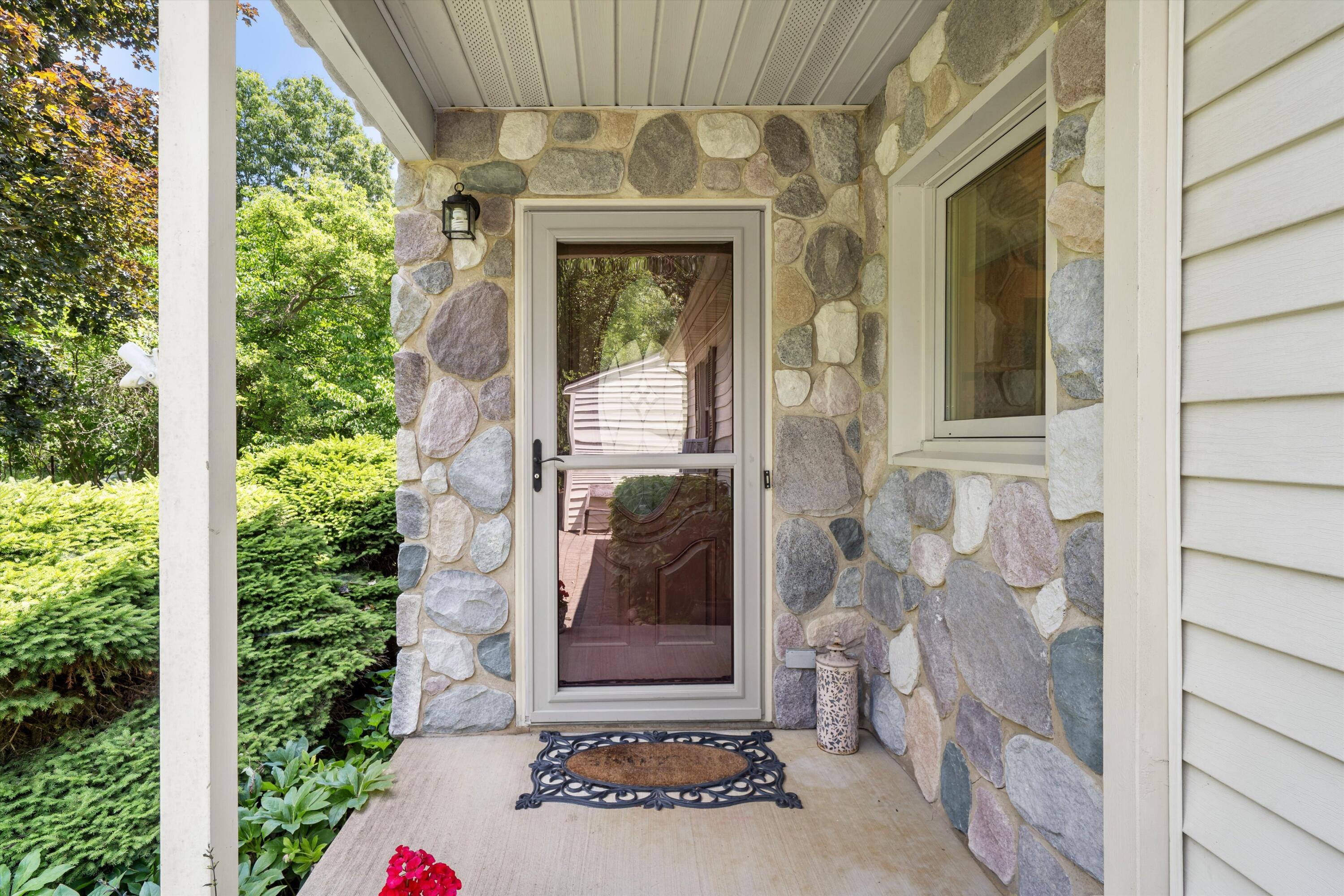 16009 Cavanaugh Lake Road Chelsea, MI 48118 - Photo 3 of 56 Front Porch