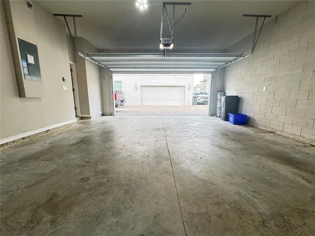 a view of empty room with a fireplace
