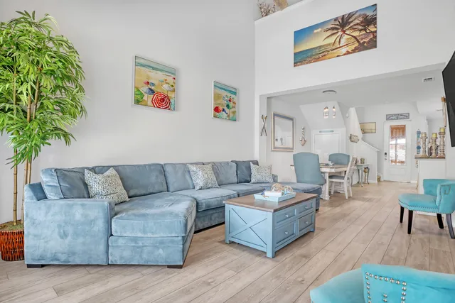 a living room with a couch and a flat screen tv