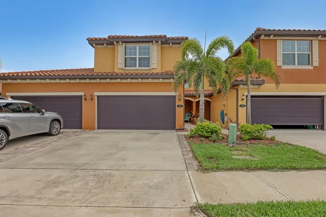 a car parked in front of a house