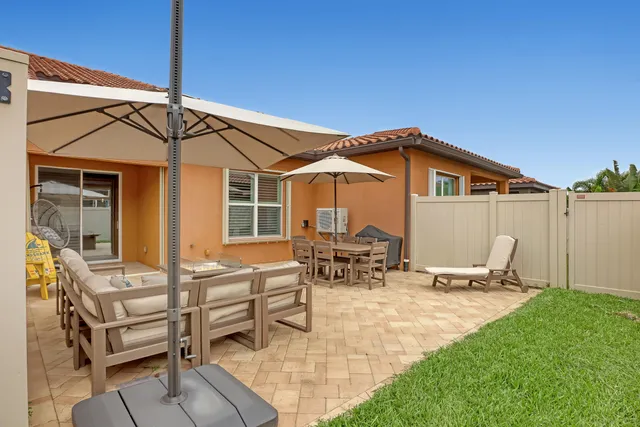 an aerial view of a house with a garden
