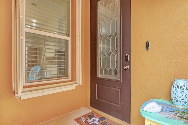 a bathroom with a window and a shower