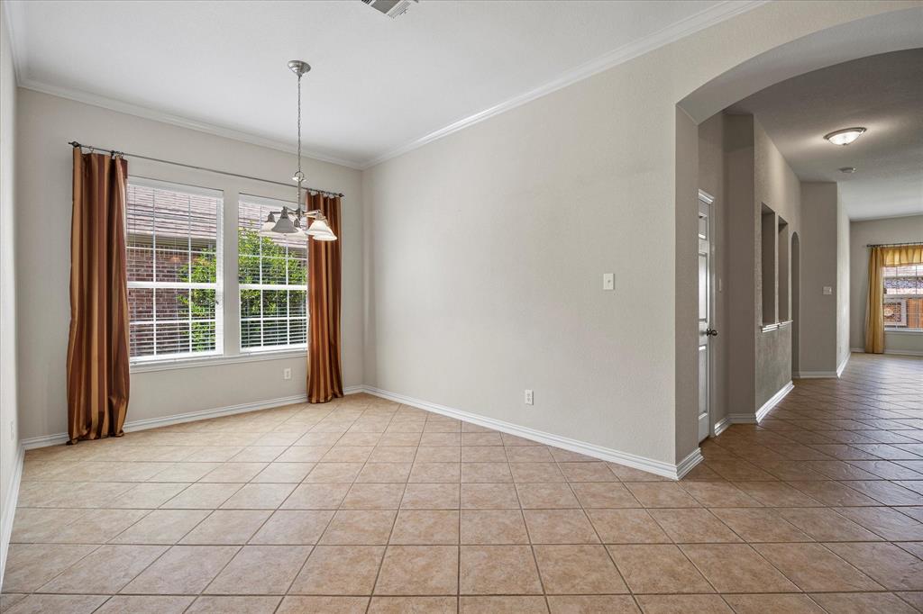 207 Leonard Way Fate, TX 75087 - Photo 11 of 31 a view of an empty room with a window