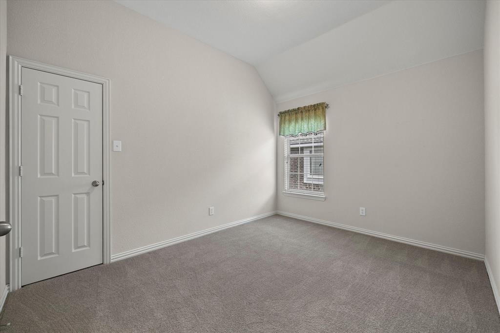 207 Leonard Way Fate, TX 75087 - Photo 20 of 31 a view of an empty room with a window