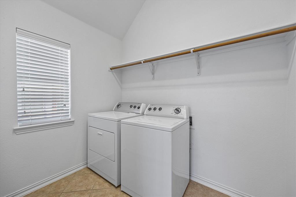 207 Leonard Way Fate, TX 75087 - Photo 23 of 31 a utility room with dryer and washer