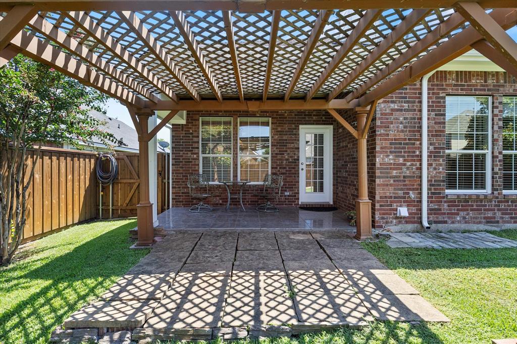 207 Leonard Way Fate, TX 75087 - Photo 25 of 31 a view of a house with a porch