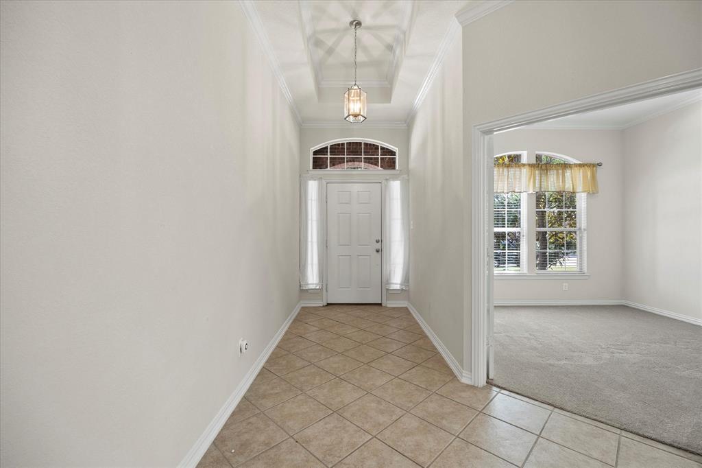 207 Leonard Way Fate, TX 75087 - Photo 9 of 31 an empty room with windows