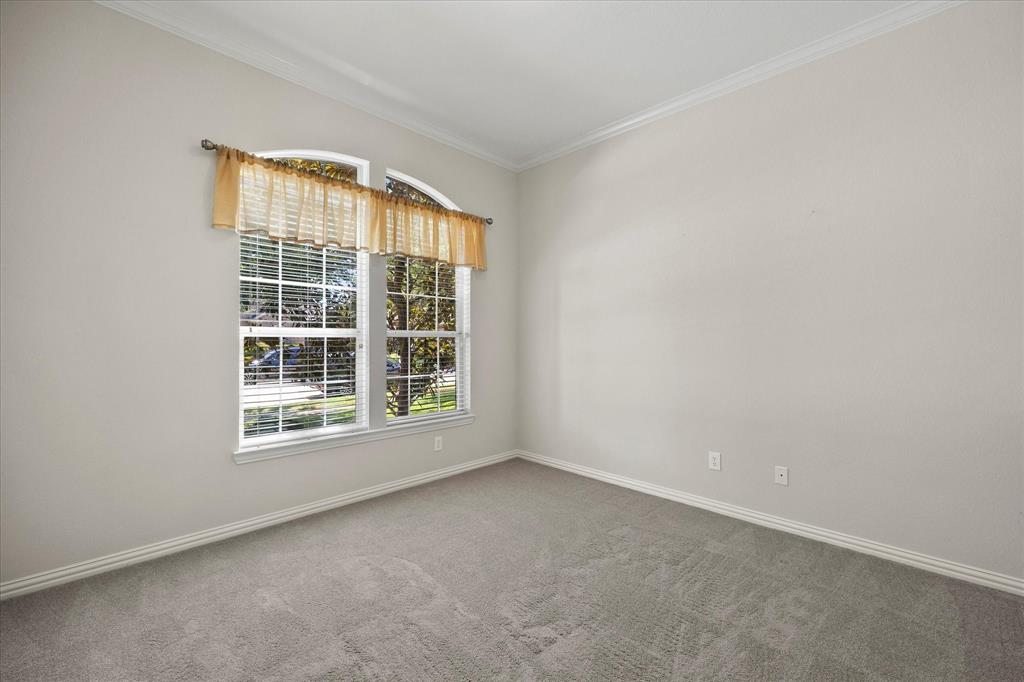 207 Leonard Way Fate, TX 75087 - Photo 10 of 31 an empty room with a window