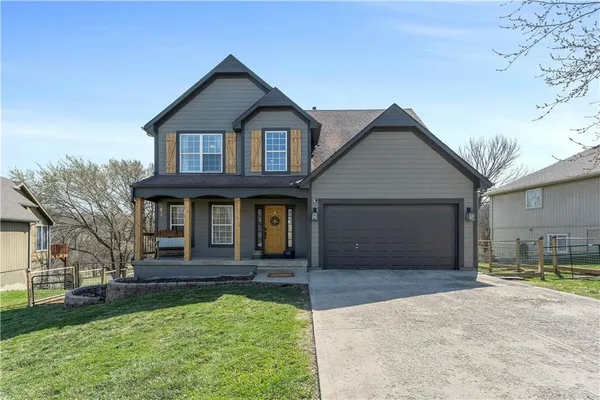 $465,000 | 215 Whispering Hills Boulevard, Lone Jack, MO 64070