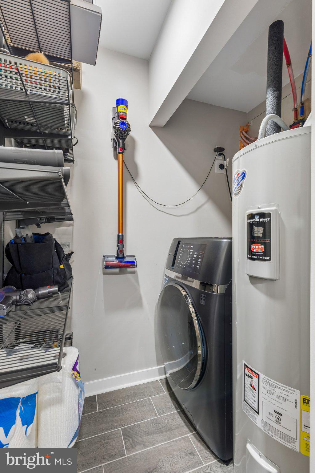 1648-50 Ridge Avenue, Unit 302 Philadelphia, PA 19130 - Photo 28 of 38 a utility room with dryer and washer