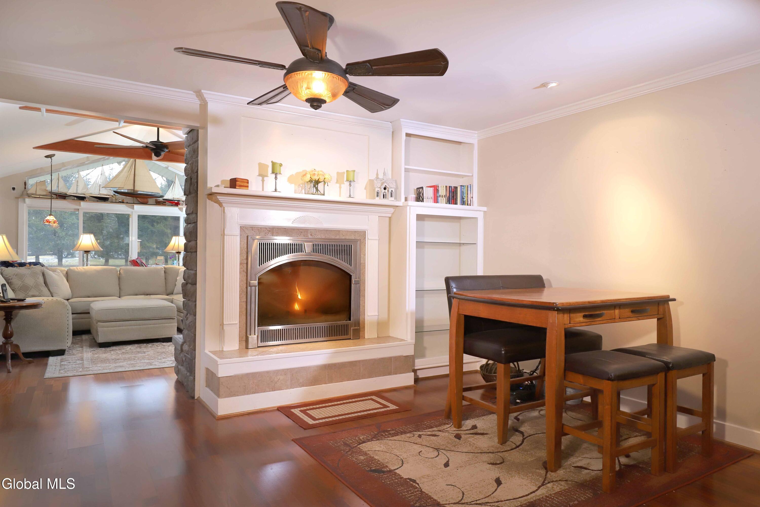 2387 Hickory Hill Road Fonda, NY 12068 - Photo 28 of 36 Dinning area fire place into living room