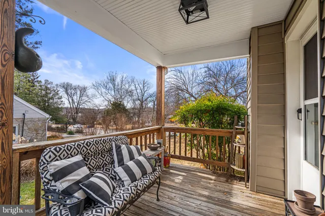 a view of balcony with furniture