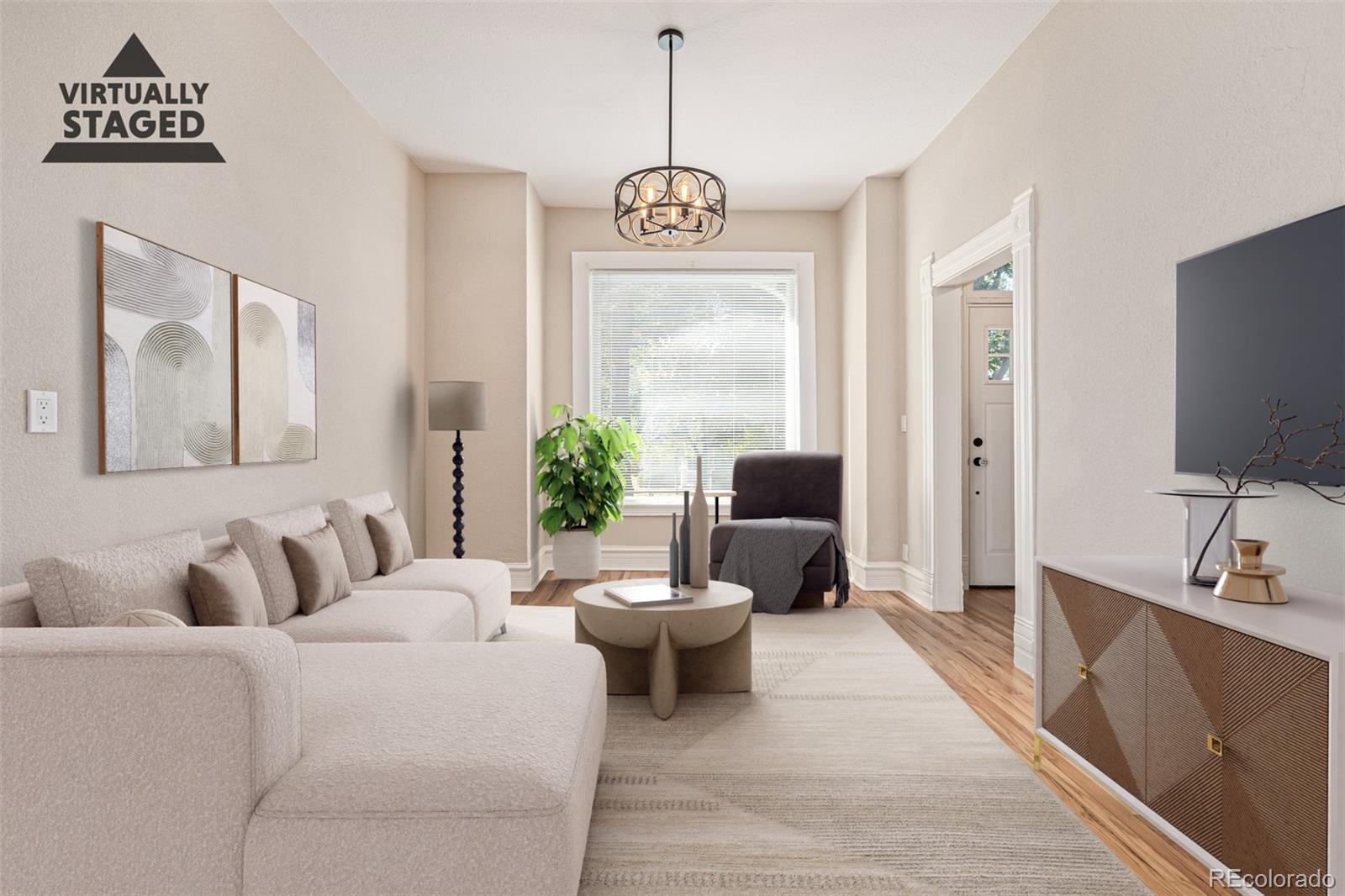 3854 Cook Street Denver, CO 80205 - Photo 4 of 42 a living room with furniture a window and a flat screen tv